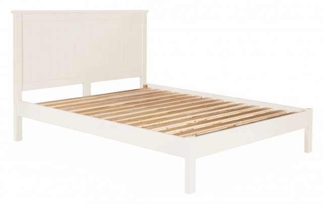 The whited painted bed had clean lined simplicity and would suit a range of decors.
